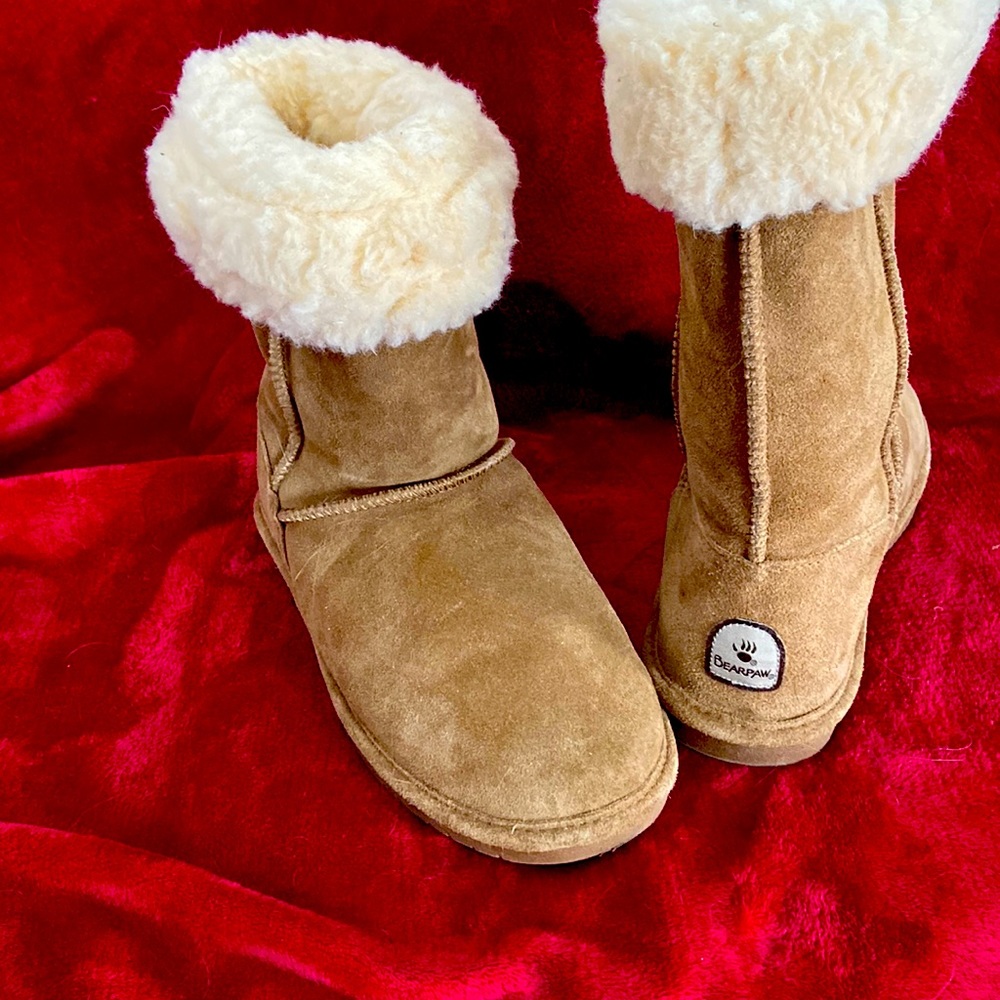 Worn once, fur folds down or up